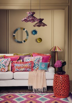 Souk ikat berber-style rug £229, Faux mohair throw £20, Rope floor lamp £119 & Madina cut-out ceramic side table £149