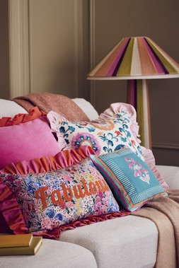 Velvet box pleat cushion £28, Fabulous cushion £38, Beldi floral cushion £28 & Moroccan Rose cushion £20