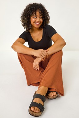 Roman Curve Rust Textured Stretch Trouser