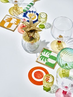 Oliver Bonas Pineapple Beaded Coasters Set of Four £19.50 -Bobbin Martini Glass Set of Two £19.50 -Pineapple Cocktail Cup £28.50 -Bobbin Gin Glass Set of Two £22.50 -Resin Coasters Set of Four £2