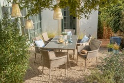 Milo 6 Seat Dining Set £599, Sintra Seagrass Tray Natural £19.99, Pitcher with daisy print & cork lid 1.1L £7.99