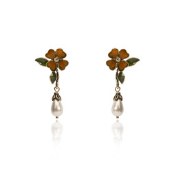 ORANGE FLOWER DROP EARRINGS £26 BY LOVETT & CO