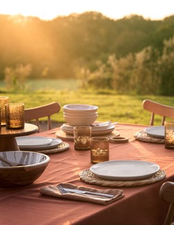 Set of Four Casual Hammered Tumbler Glasses £20 / Set of Two Newark Spindle Dining Chairs £299 / Set of Four Reactive Cereal Bowls £12 / Set of Four Reactive Dinner Plates £15 / Wooden Cake Stand £15 / Set of Four Natural Water Hyacinth Placemats £20 / Wooden Serving Board £20 / Marble Serving Bowl £20 / Cotton with Linen Tablecloth £25 / Set of 2 Pure Linen Napkins £10